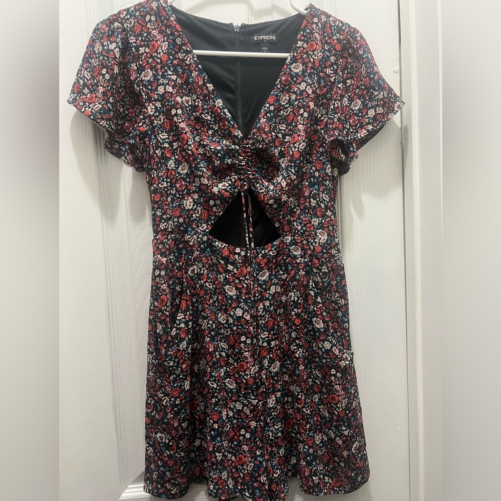 Black jumpsuit with red and pink flowers